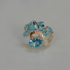 Срібна каблучка з золотими вставками