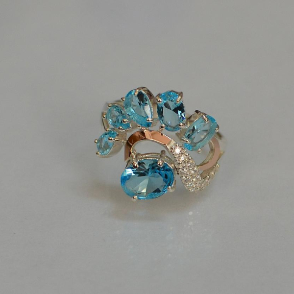 Срібна каблучка з золотими вставками