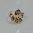 Срібна каблучка з золотими вставками