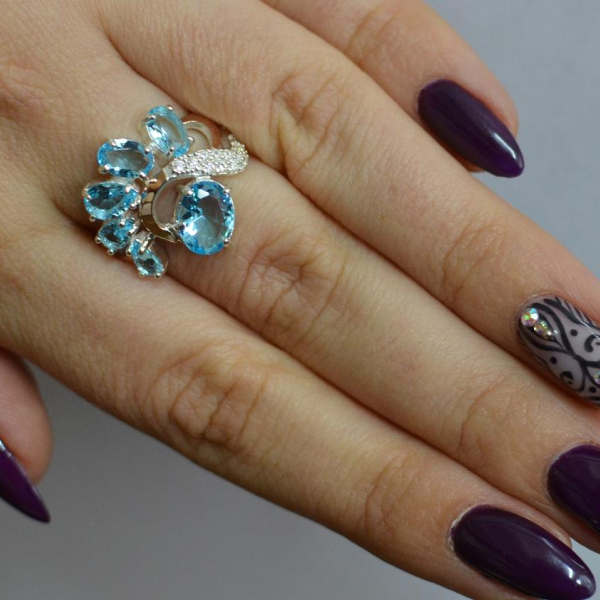 Срібна каблучка з золотими вставками