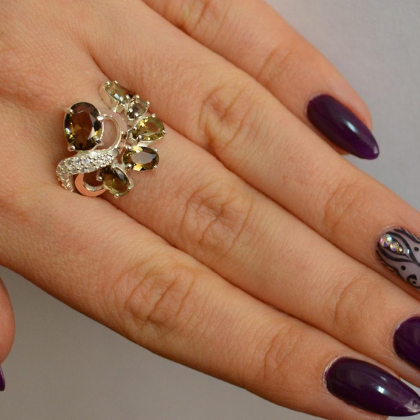 Срібна каблучка з золотими вставками