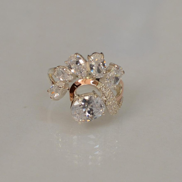 Срібна каблучка з золотими вставками