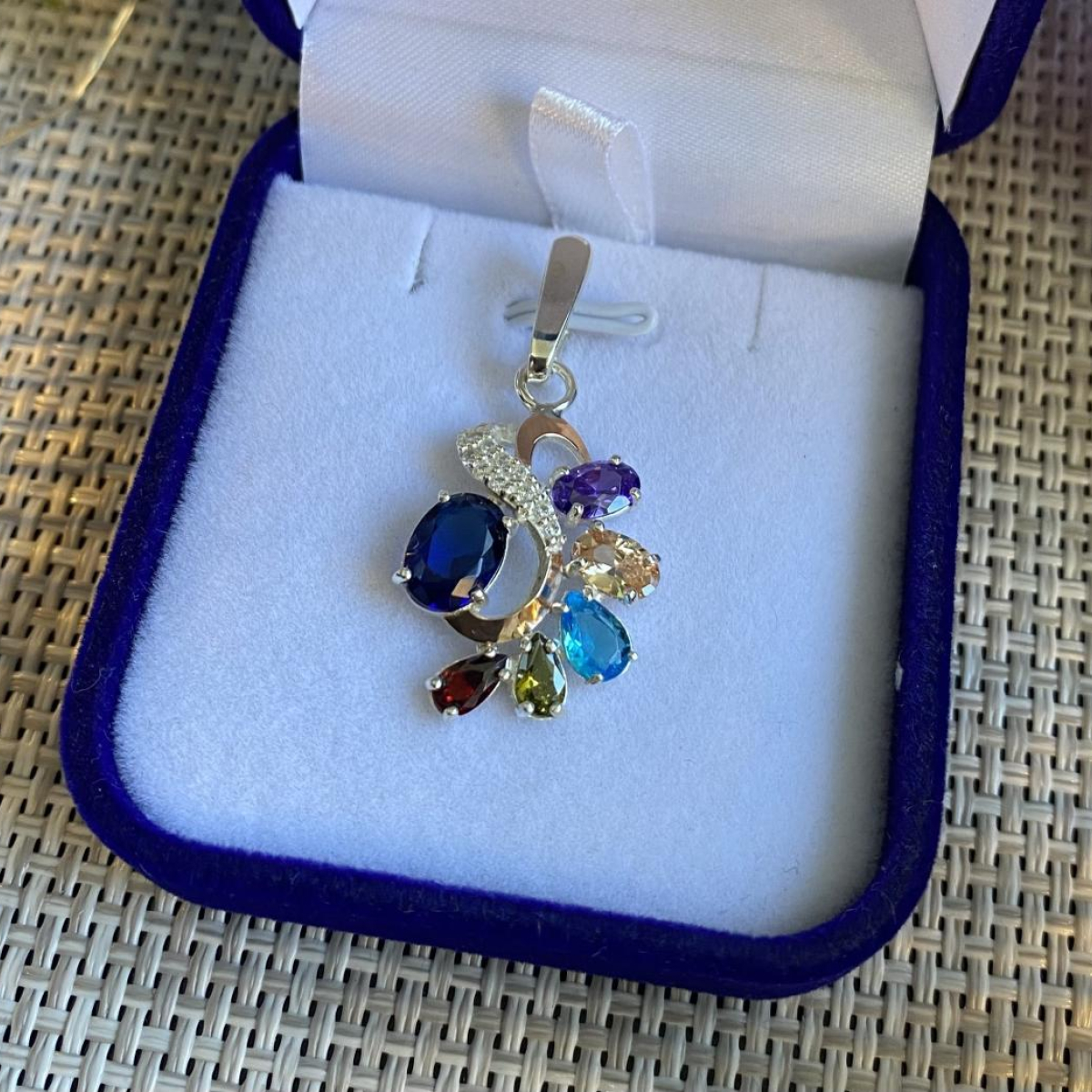 Срібна підвіска з пластинами золота