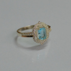 Срібна каблучка з золотими вставками