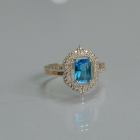 Срібна каблучка з золотими вставками