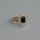 Срібна каблучка з золотими вставками