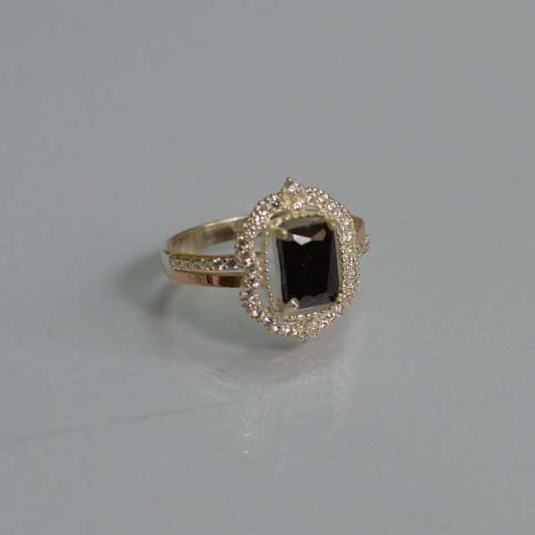 Срібна каблучка з золотими вставками