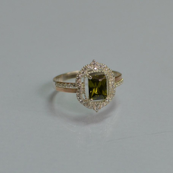 Срібна каблучка з золотими вставками