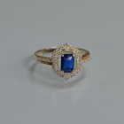 Срібна каблучка з золотими вставками