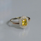 Срібна каблучка з золотими вставками