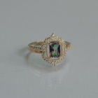 Срібна каблучка з золотими вставками