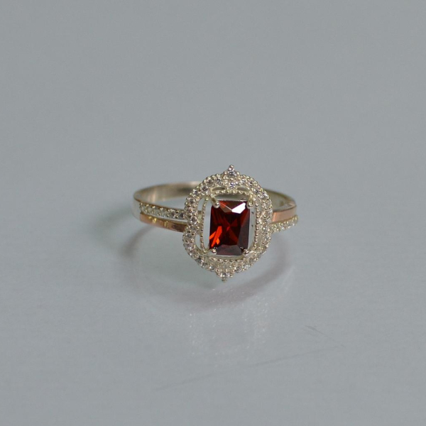 Срібна каблучка з золотими вставками