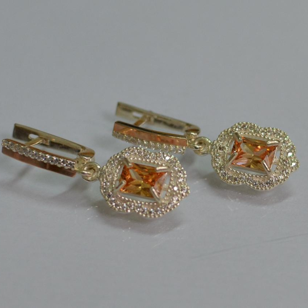 Срібні сережки з золотими вставками