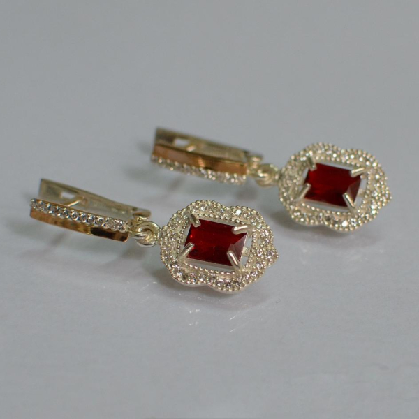 Срібні сережки з золотими вставками