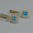 Срібні сережки з золотими вставками