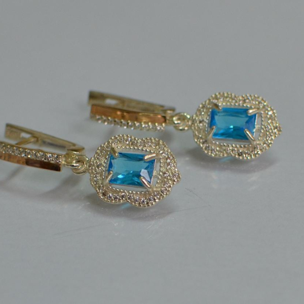 Срібні сережки з золотими вставками