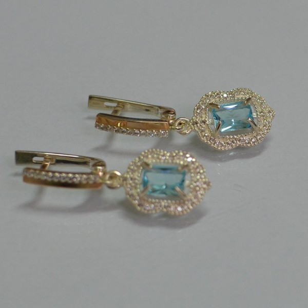 Срібні сережки з золотими вставками