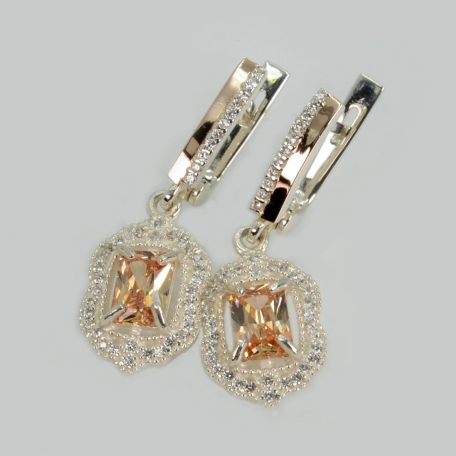 Срібні сережки з золотими вставками