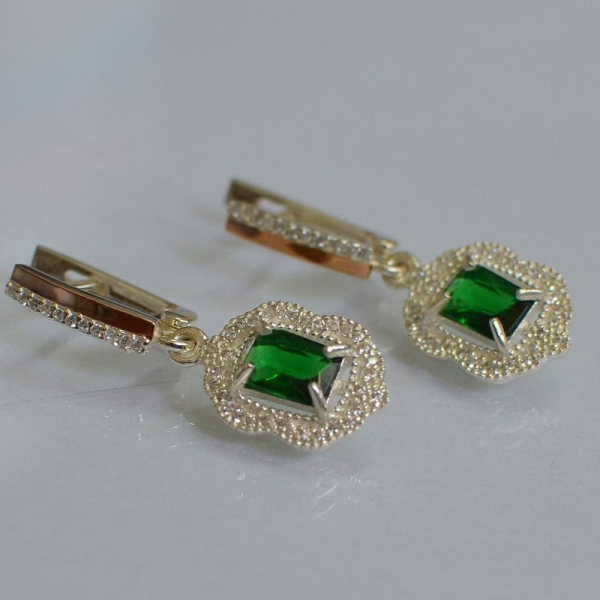 Срібні сережки з золотими вставками