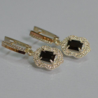 Срібні сережки з золотими вставками