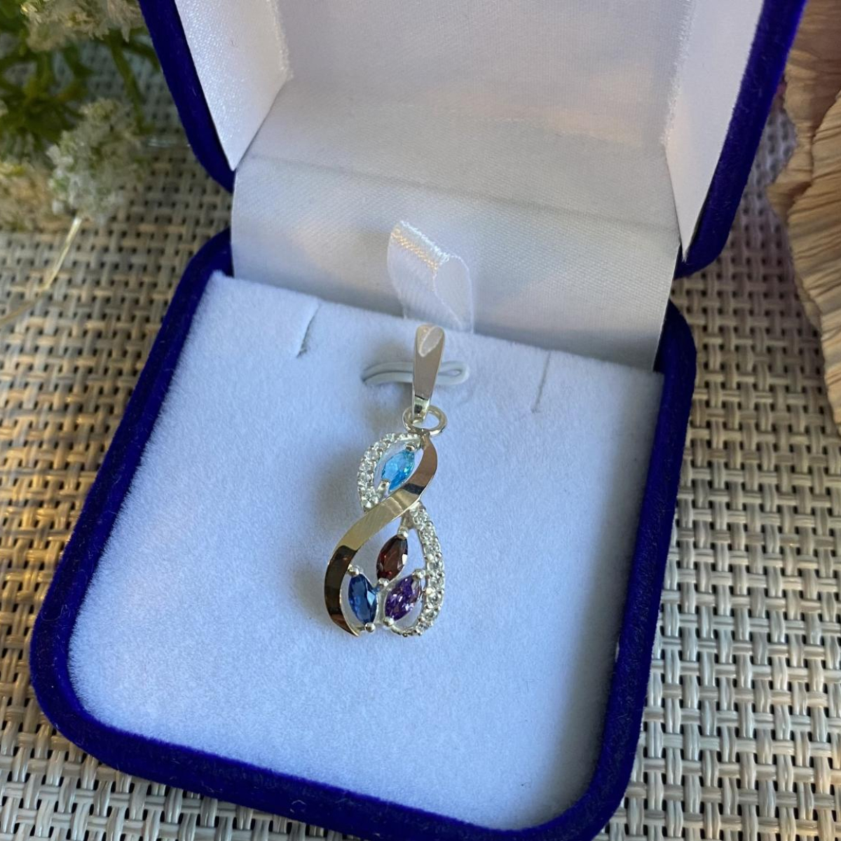 Срібна підвіска з пластинами золота