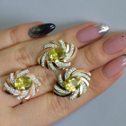 Срібний набір з золотими пластинами