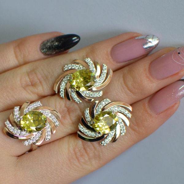 Срібний набір з золотими пластинами