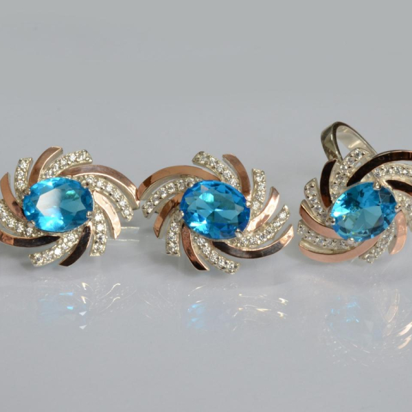 Срібний набір з золотими пластинами