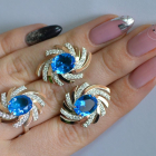 Срібний набір з золотими пластинами