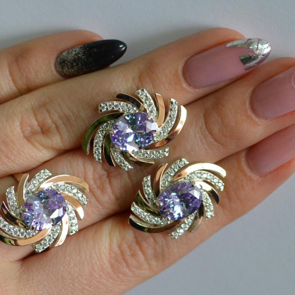 Срібний набір з золотими пластинами