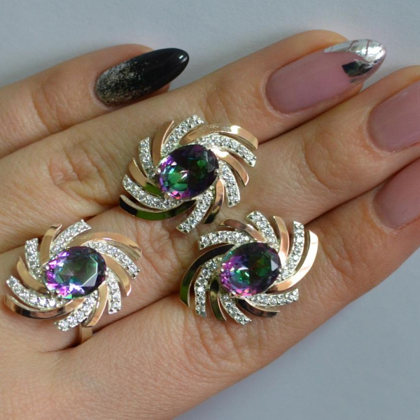 Срібний набір з золотими пластинами