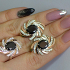 Срібний набір з золотими пластинами