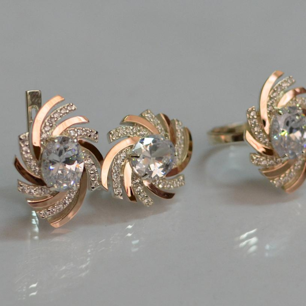 Срібний набір з золотими пластинами