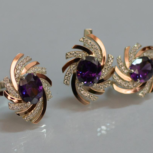 Срібний набір з золотими пластинами