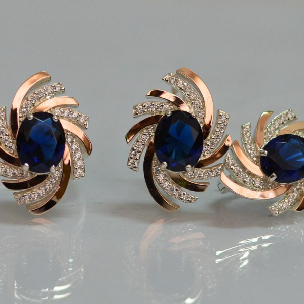 Срібний набір з золотими пластинами