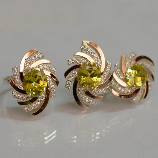 Срібний набір з золотими пластинами