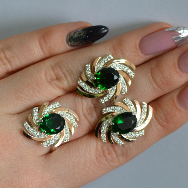 Срібний набір з золотими пластинами