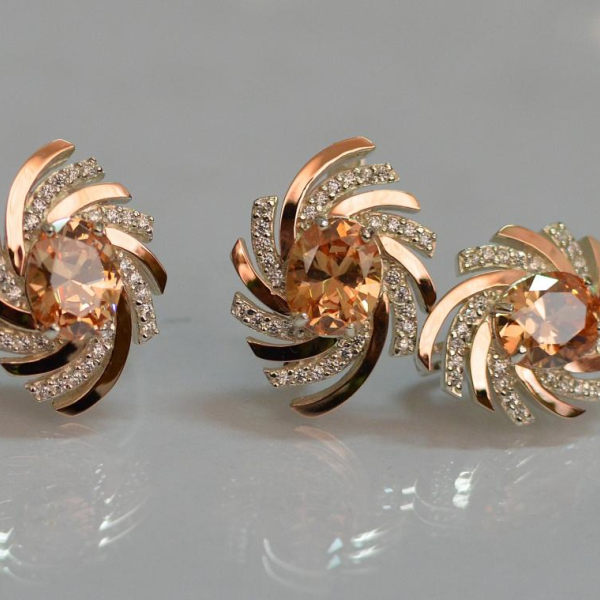 Срібний набір з золотими пластинами