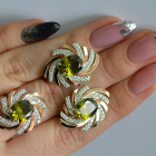 Срібний набір з золотими пластинами