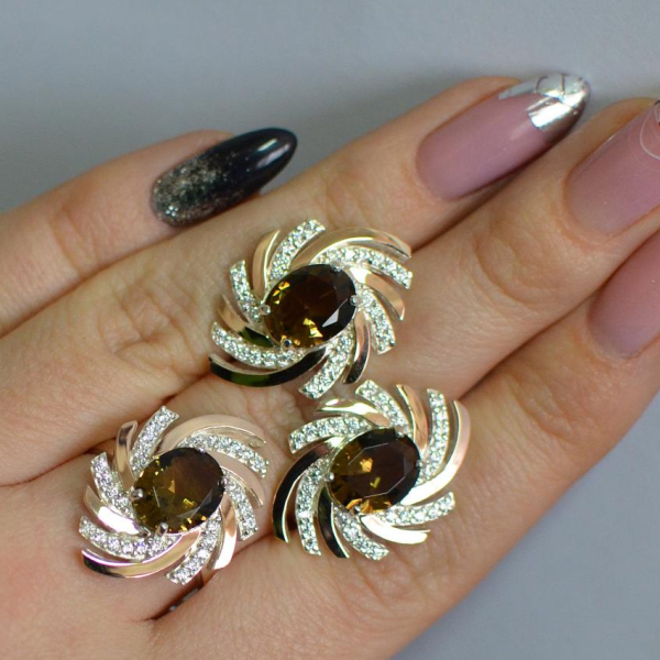 Срібний набір з золотими пластинами