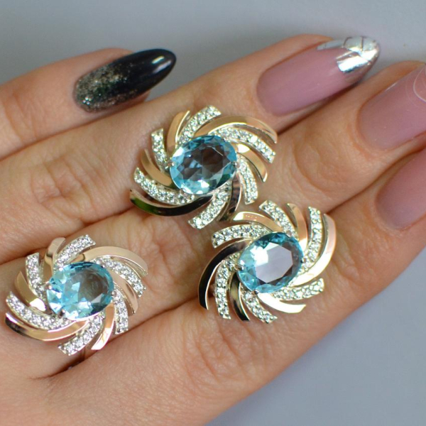 Срібний набір з золотими пластинами