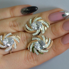 Срібний набір з золотими пластинами