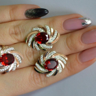 Срібний набір з золотими пластинами