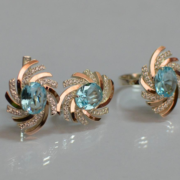 Срібний набір з золотими пластинами