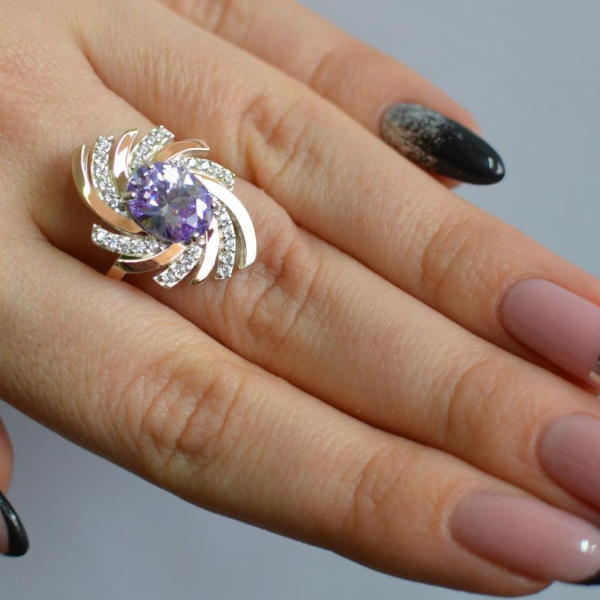 Срібна каблучка з золотими вставками