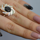 Срібна каблучка з золотими вставками