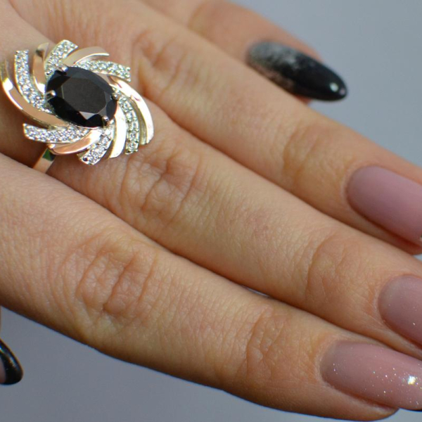 Срібна каблучка з золотими вставками