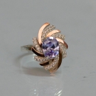 Срібна каблучка з золотими вставками