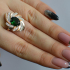 Срібна каблучка з золотими вставками