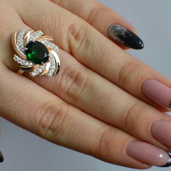 Срібна каблучка з золотими вставками